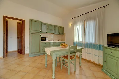 Appartement in Badesi met gedeeld zwembad