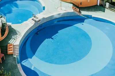 Appartamento con terrazza sul mare e piscina