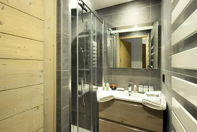 Appartamento nelle Alpi con sci