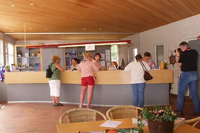 Bungalow am Wasser mit privatem Steg