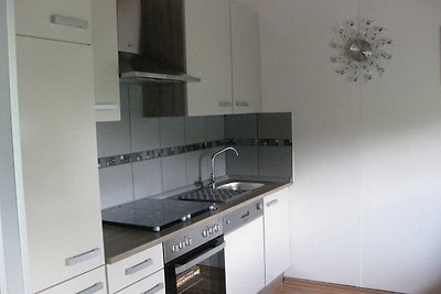 Freistehender Bungalow mit Ofen in einem...