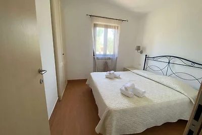Appartamento con piscina comune