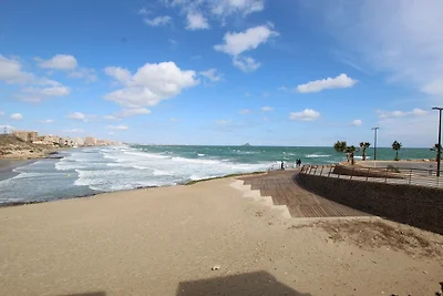 Appartamento vista mare a La Manga con giardi...