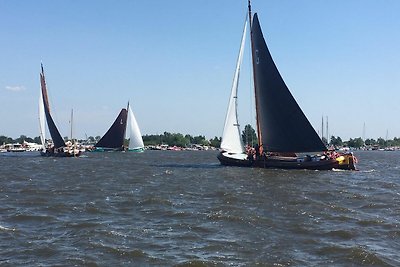 Huisje met ruime tuin in watersport gebied