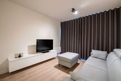 Modern appartement vlakbij zee en strand