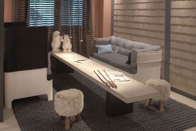Luxuriöse Wohnung an den Pisten im geschäftig...