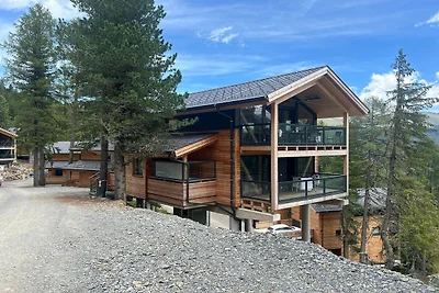 Chalet mit Sauna auf dem Balkon