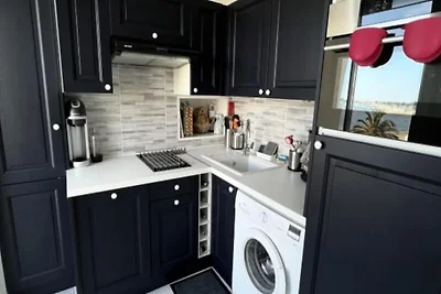 Wohnung in Grau du Roi mit Meerblick