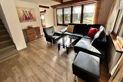 Chalet met 2 appartementen omgeven door...