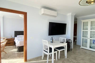 Wohnung in Nerja mit Garten und Poolblick