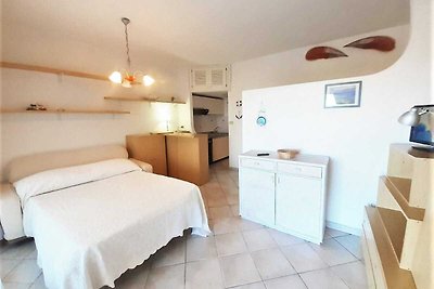 Lovely holiday home in Marinella with shared...