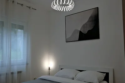 Ampio appartamento con terrazza coperta
