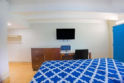 Łóżko typu queen-size dostępne dla osób...
