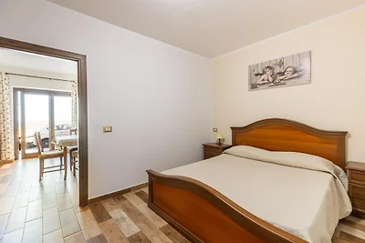 Wohnung mit Veranda und privatem Parkplatz