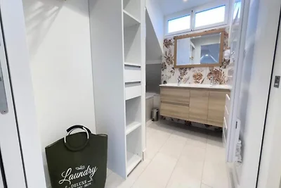 Regent House en Spa boven de golven