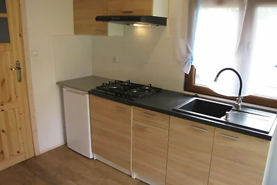 Ferienhaus aus Holz in der Nähe des Sees