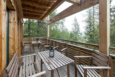 Chalet attraente con vasca idromassaggio