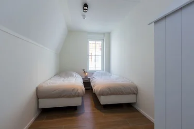 Üppige Wohnung mit Dachterrasse
