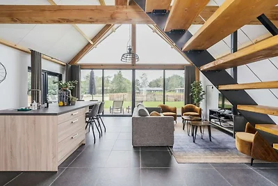 Soggiorno in lodge moderno con vista sullo...