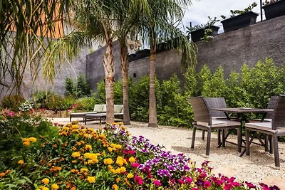 Leone Apartment with Garden