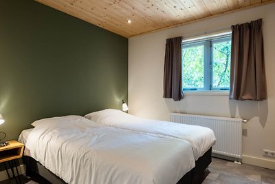 Sfeervolle lodge met vlonder op de Veluwe