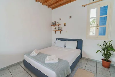 Haus in Ornos mit Meerblick