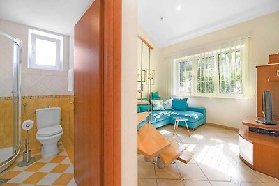 Appartement met gedeelde jacuzzi op het eilan...