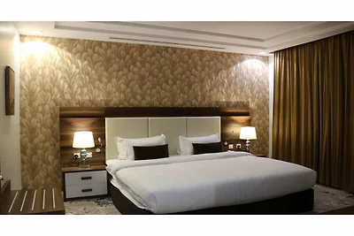 Deluxe-Zimmer mit Kingsize-Bett und...