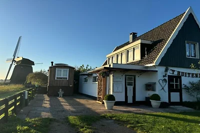 Schönes kleines Haus mit Blick auf die Mühle