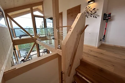Chalet mit Sauna auf dem Balkon