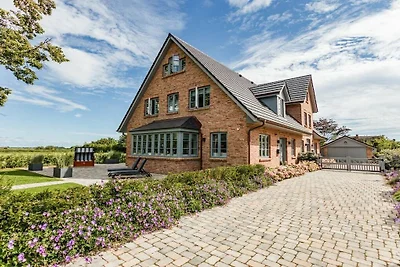 Ferienhaus in Midlum mit Sauna und Wifi