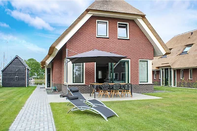 Villa mit Garten in einem Ferienpark am...