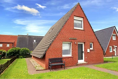 Ferienhaus Toms Hütte mit Terrasse in Dornum
