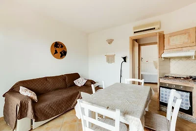 Mit privatem Garten und Klimaanlage