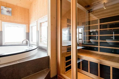 Chalet attraente con vasca idromassaggio