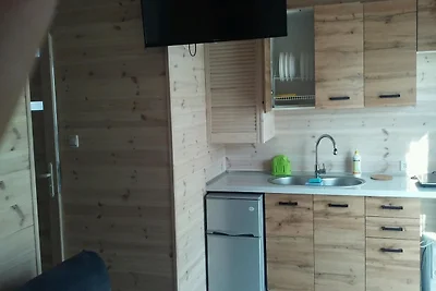 Eingeschossige Ferienhäuser mit 1...