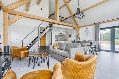 Soggiorno in lodge moderno con vista sullo...