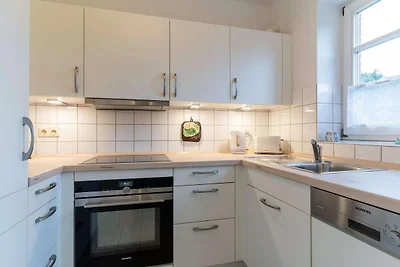 Apartment mit Kamin in einer reetgedeckten...