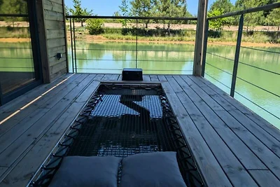 Ferienhaus an einem privaten Teich mit Blick ...