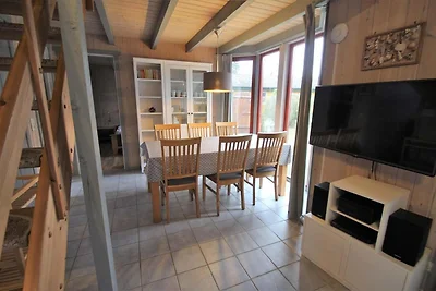 Cottage sul prato sul lago