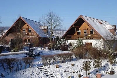 Maison de vacances avec loggia dans la forêt ...