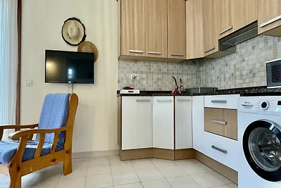 Appartamento Cala Montgo con piscina