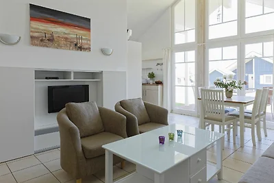 Bungalow moderno con stufa a legna e vista...
