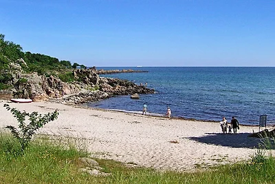 6 person holiday park home in Gudhjem