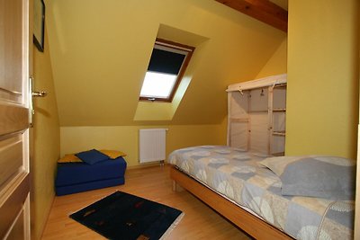 Holiday flat on small holiday farm with indoo...