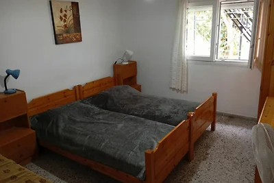 Appartamento in una casa privata con giardino