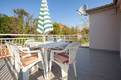 Appartamento in casa con terrazza coperta