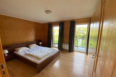 Modernes Ferienhaus mit ruhigem Garten in...