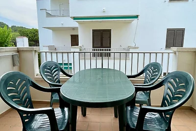 Appartamento Cala Montgo con piscina