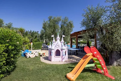 Appartamento con piscina comune
